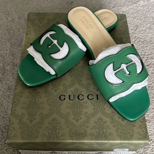 Green interlocking G cut out sandal.
